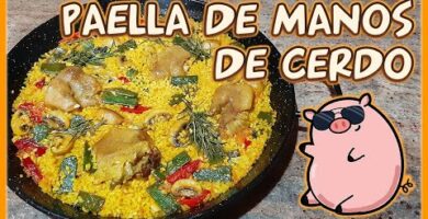 Saborea Nuestra Deliciosa Paella De Arroz Con Manitas De Cerdo. Fácil De Hacer Y Irresistible. ¡Haz Clic Para Disfrutarla Ahora!